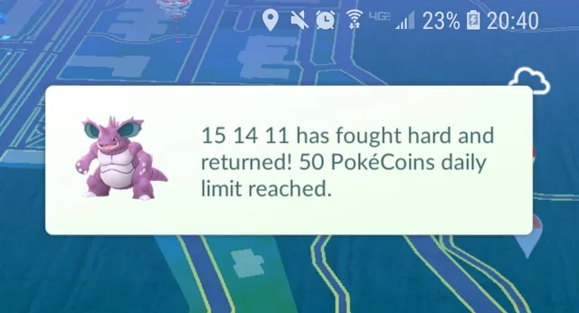 Pokémon GO notification showing a Nidorino defending a gym and reaching the daily limit of 50 PokéCoins earned from gym battles